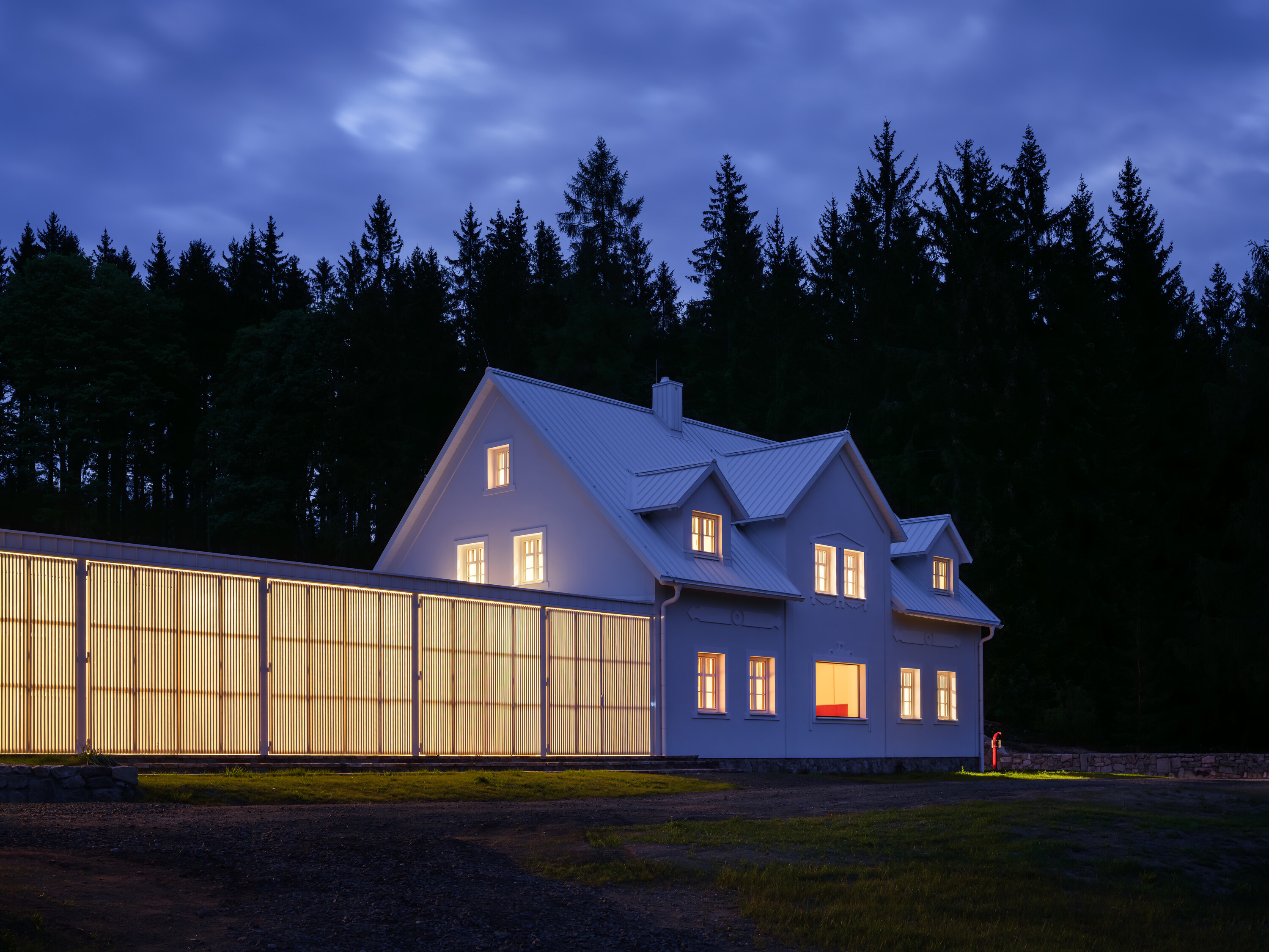 The restored house at dusk