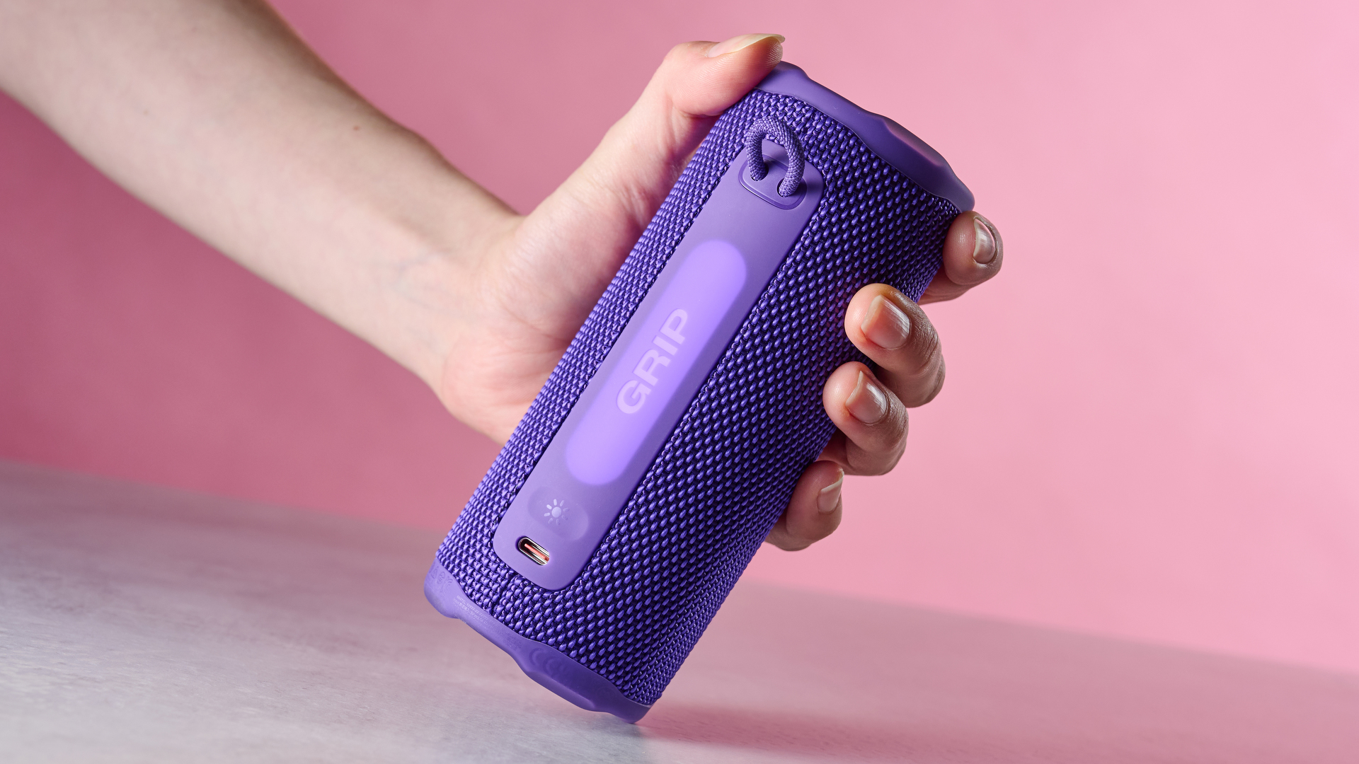 JBL Grip held in hand
