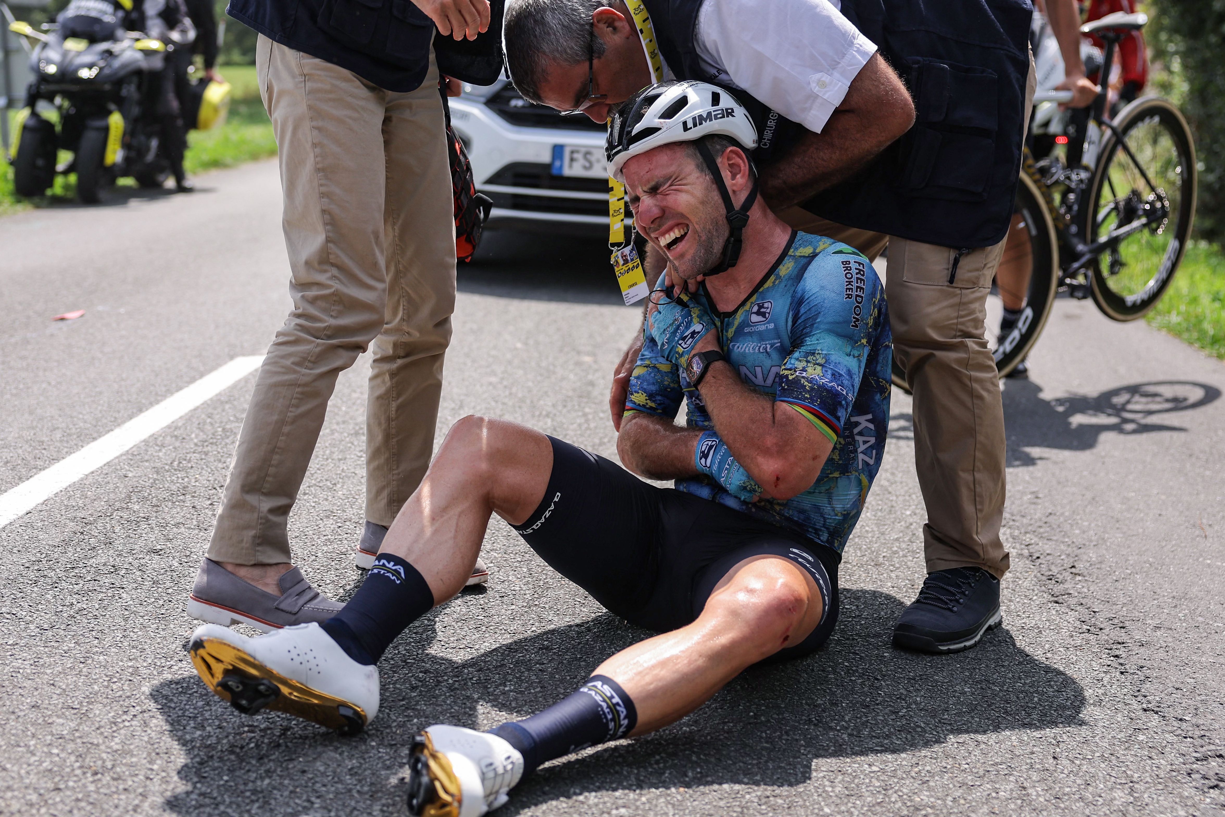 TOPSHOT Astana Qazaqstan Teams British rider Mark Cavendish receives medical attention after suffering a crash during the 8th stage of the 110th edition of the Tour de France cycling race 201 km between Libourne and Limoges in central western France on July 8 2023 Mark Cavendish crashed out of the Tour de France on June 8 2023 after a fall 140km into stage eight left the star British cyclist with what appeared to be a broken collarbone Photo by Thomas SAMSON AFP Photo by THOMAS SAMSONAFP via Getty Images