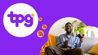 A man sitting on a sofa looking excited and holding a games console controller in his hand. The new TPG logo is in the top left of the image.