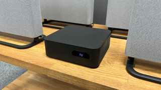 Sony Bravia Theatre Quads wireless speaker package with speakers surrounding connectivity hub