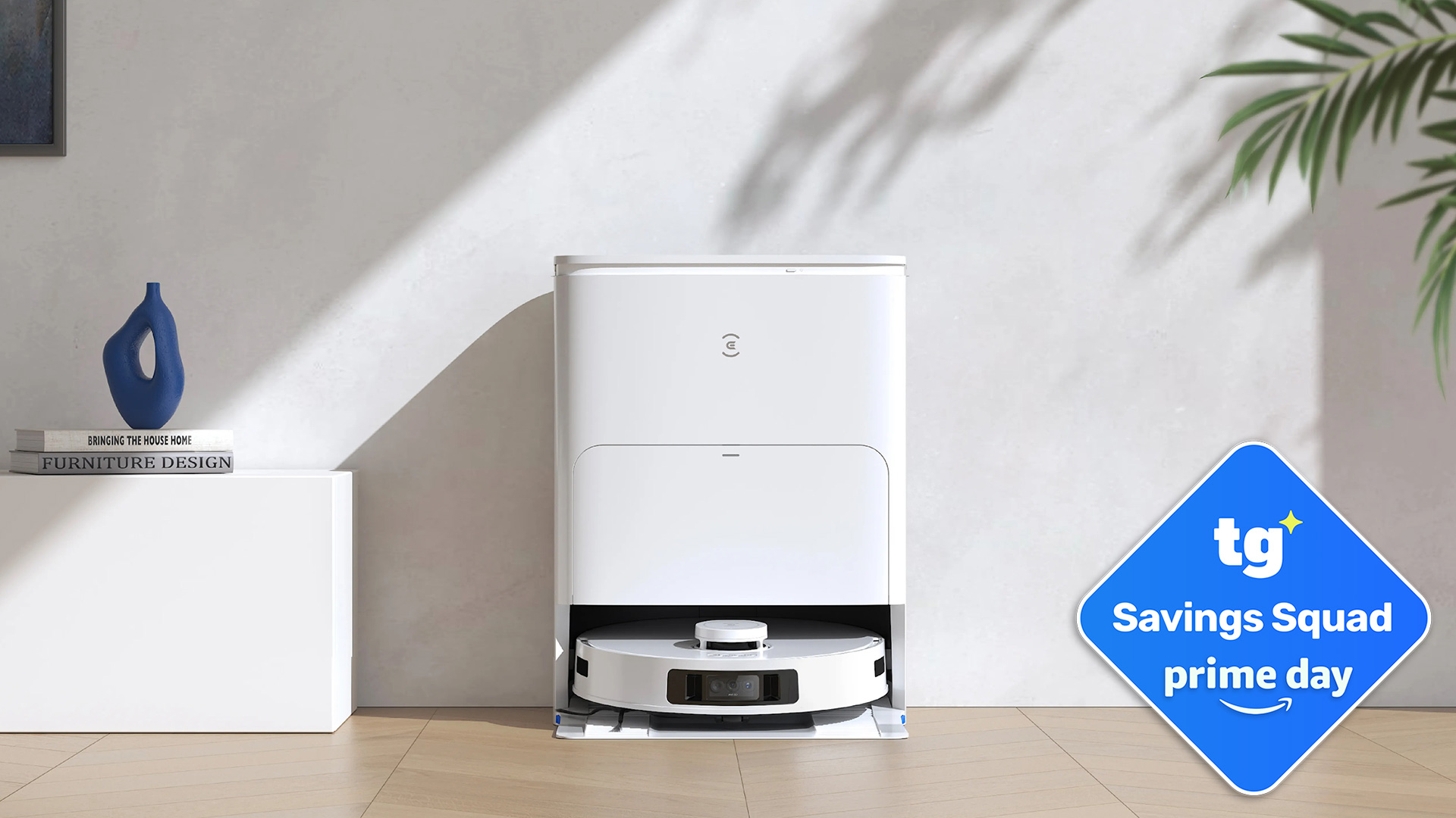 ECOVACS DEEBOT T30S Pro in living room environment with TG Savings Squad Prime Day deal badge overlaid