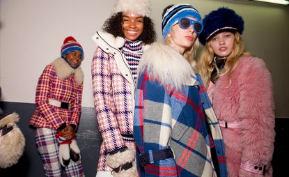 In the women’s collection, an oversized plaid coat with a fur collar made for a funky, yet chic look.