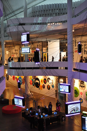 Digital web: displays suspended within the curvaceous interior of the Biennale.