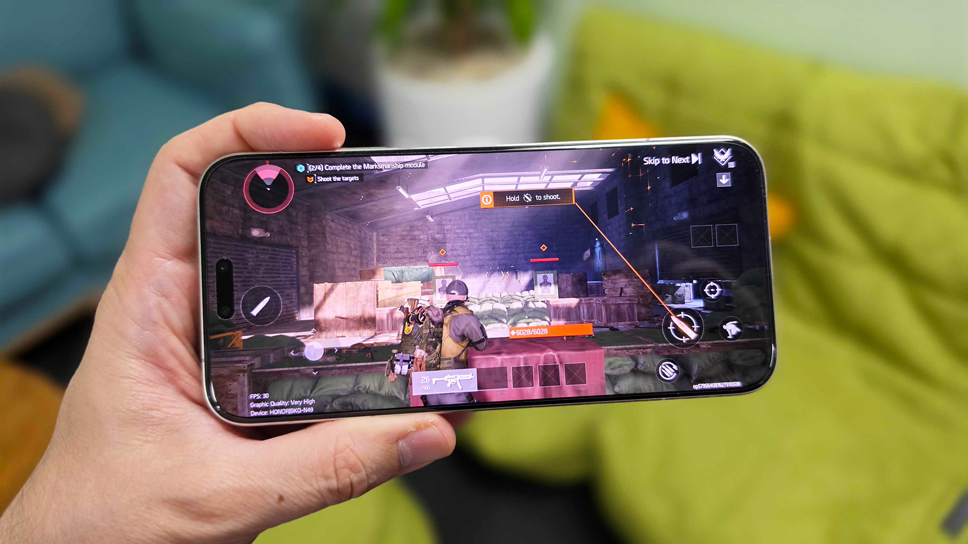 In-hand image of the Honor Magic8 Pro showing the game The Division Resurgence