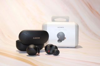 Sony Wf1000xm4 earbuds lying out of case