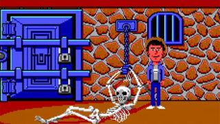 '80s adventure game Maniac Mansion with a man standing and smiling next to a skeleton chained to a wall