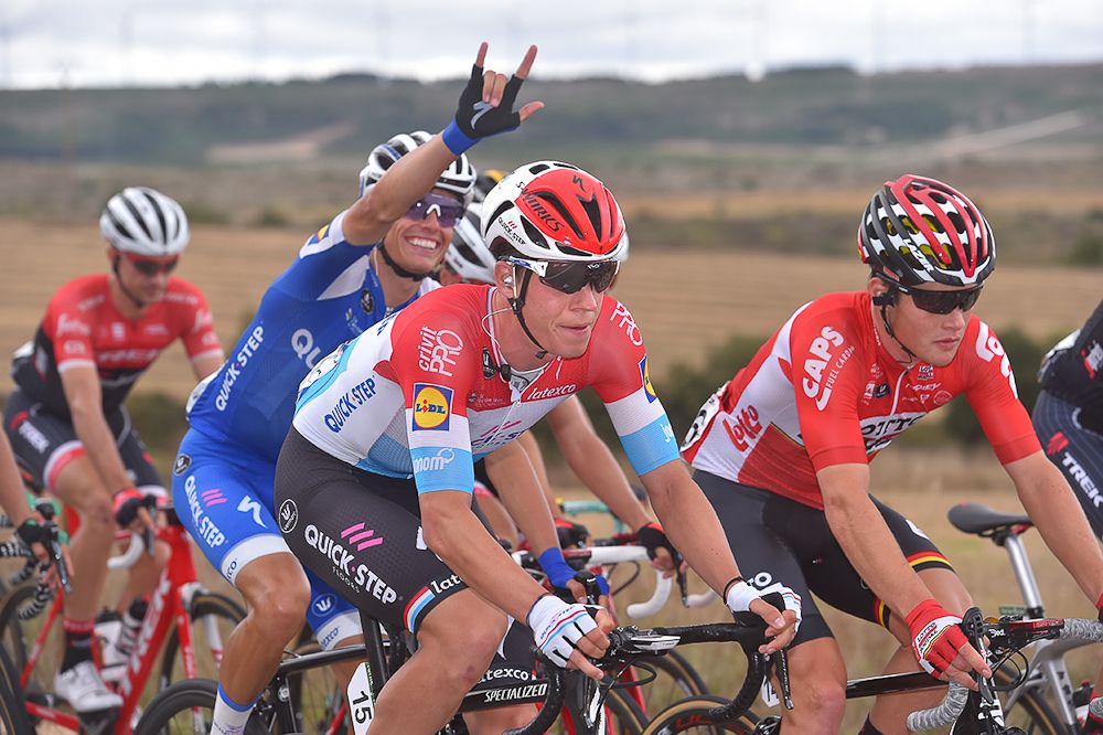 Quick-Step riders joke around during stage 17 at the Vuelta