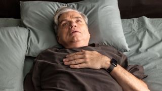 Dr. Charles in bed in the morning of The Book of Charles in Chicago Med Season 11x15