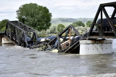 The remains of a derailed train in Montana following a bridge collapse. 
