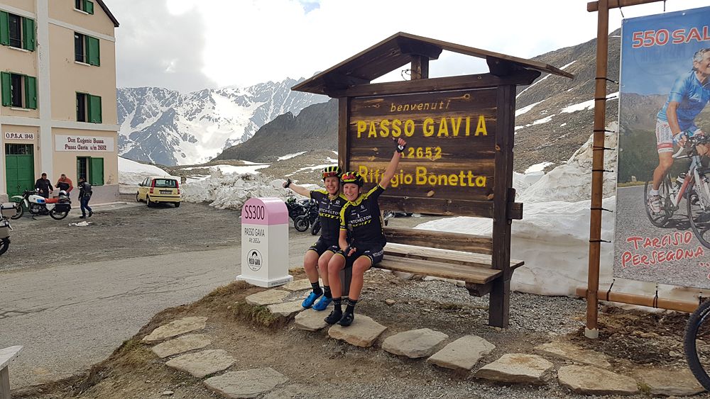 Annemiek van Vleuten and Amanda Spratt at the top of a snowy Passo Gavia
