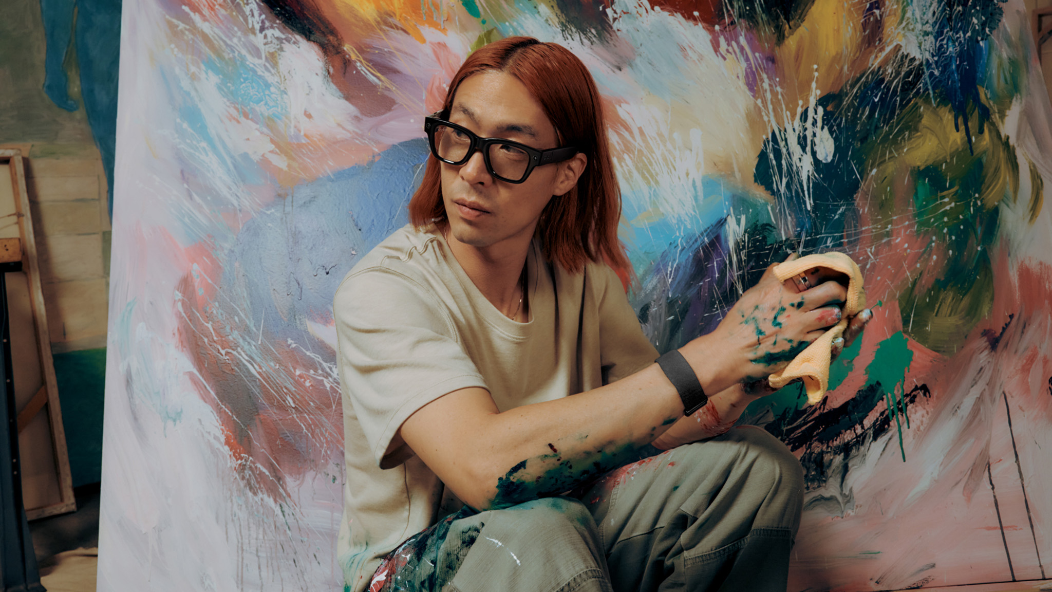An official lifestyle shot of someone wearing Meta Ray-Ban Display Glasses
