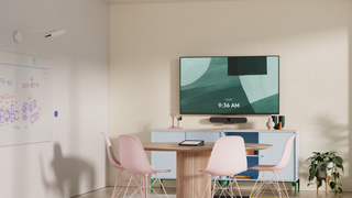 A room with a big display using Logitech's new all-in-one video bar.