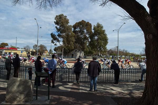 The peloton make their way around the roundabout at the bottom end of the 1.5km street circuit in Swan Hill.