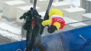 Video footage of Skier running into cameraman at the Beijing Olympics