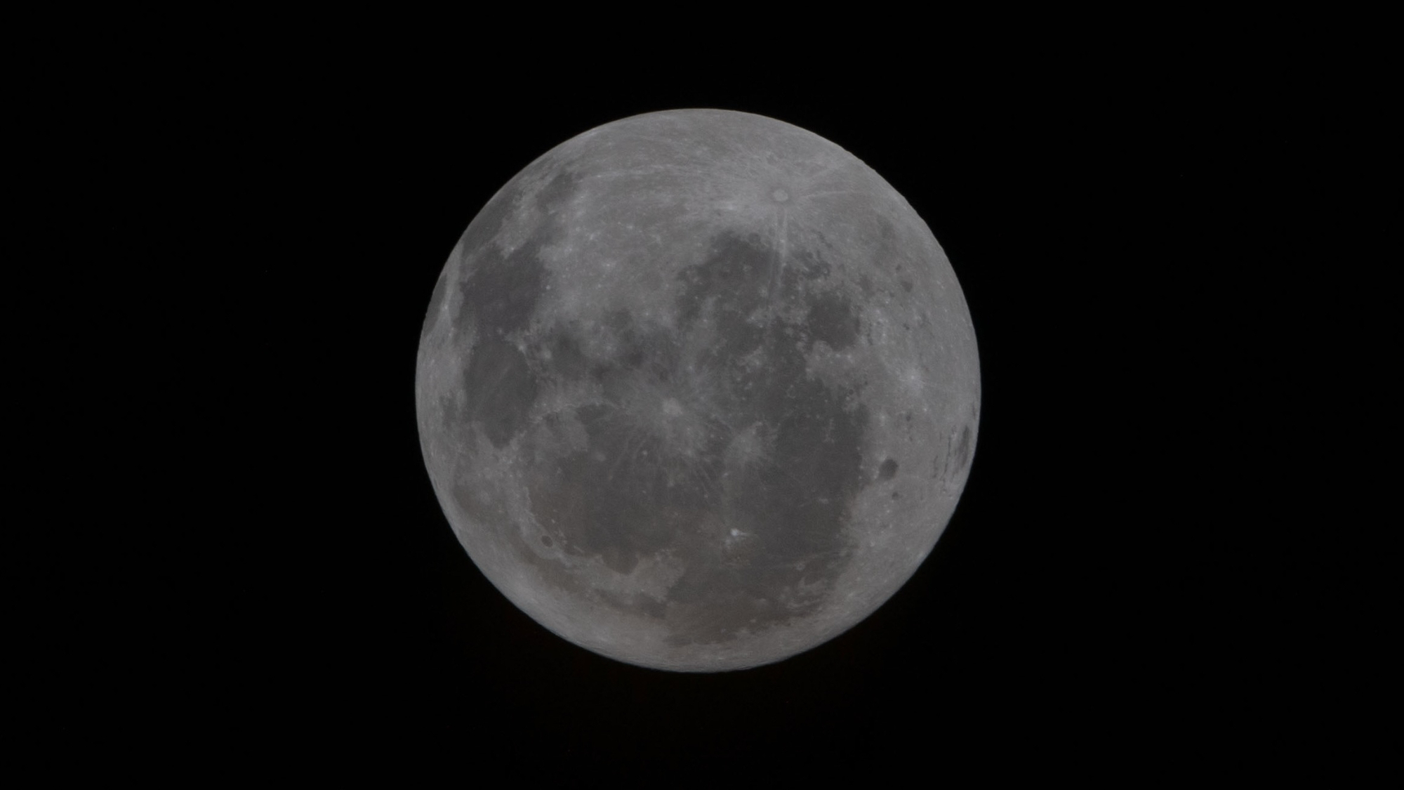 view of the full, big disk of the moon taken by the Artemis 2 astronauts