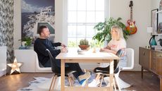 Lisa and Joe Dawson sitting in their dining room