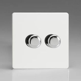 A stainless steel dimmer light switch