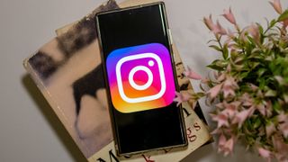 Instagram logo on a phone screen