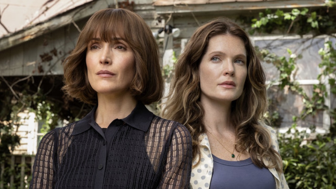 Samantha and Charlotte standing in backyard in The Good Daughter