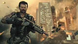 Black Ops games in order: A man walking through a ruined city during Call of Duty Black Ops 2