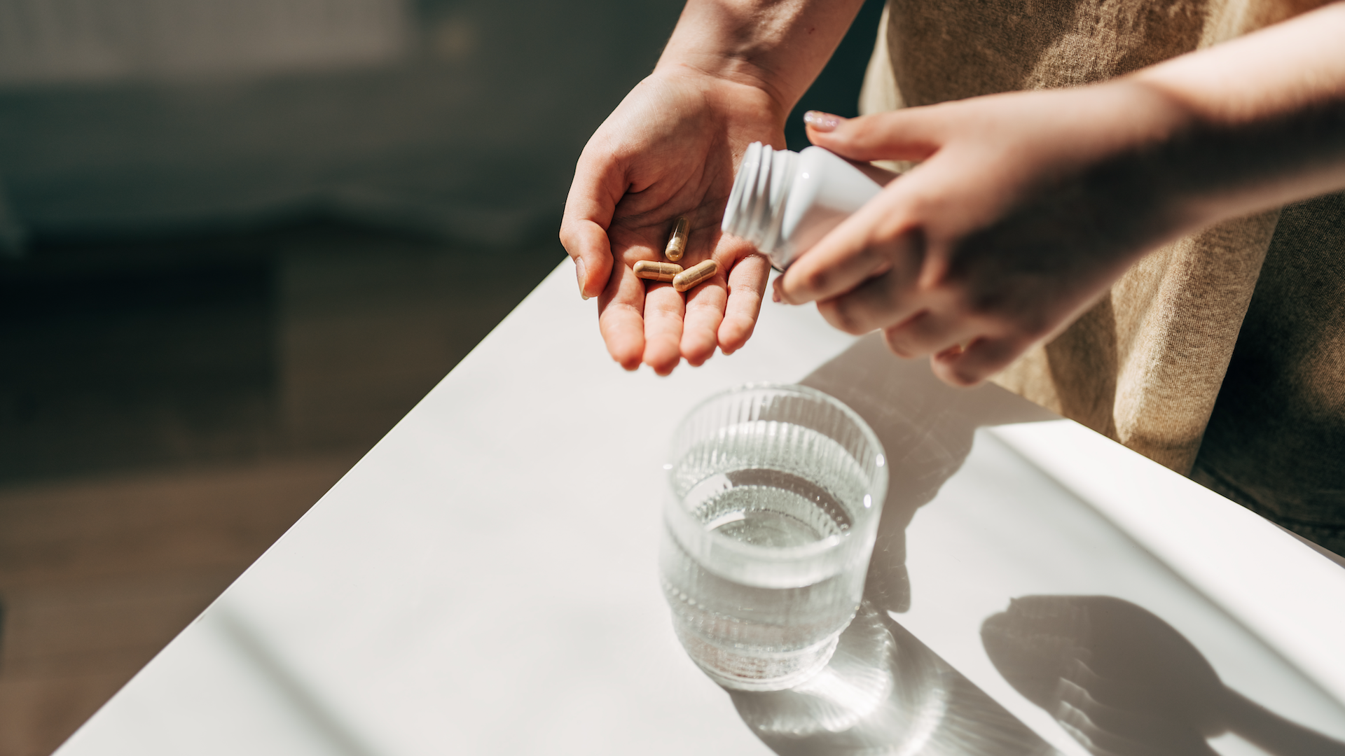 Woman taking supplements