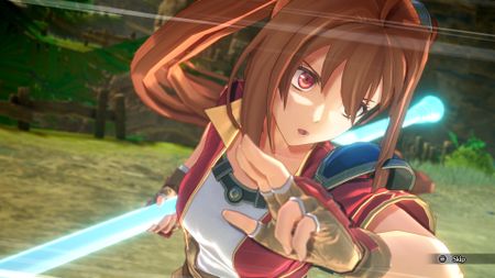 Estelle begins to spin as she uses a special attack in Trails in the Sky 1st Chapter, her staff glowing blue her hair twirls