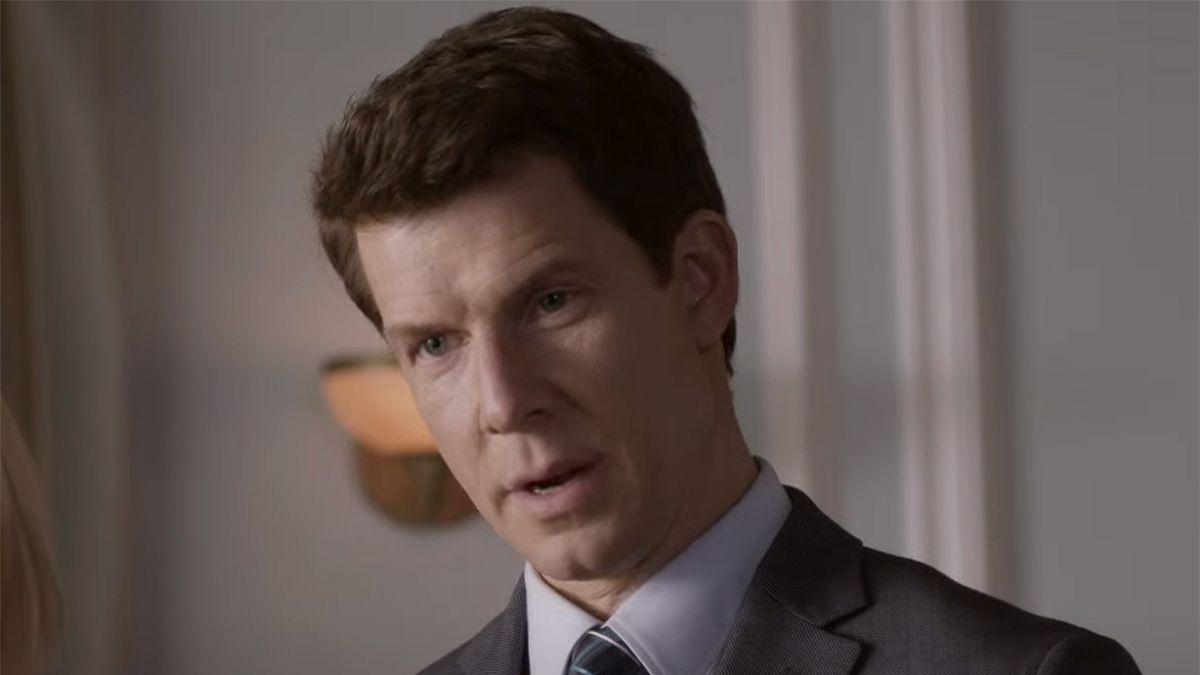 A scene featuring a Postables letter return with Eric Mabius in his signature suit.