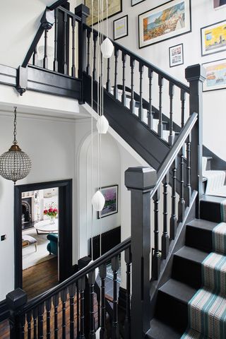 hallway dark charcoal grey staircase with carpet