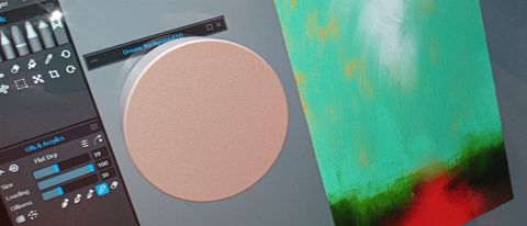 Surface Dial review; a small metal circular gadget attached to a computer screen
