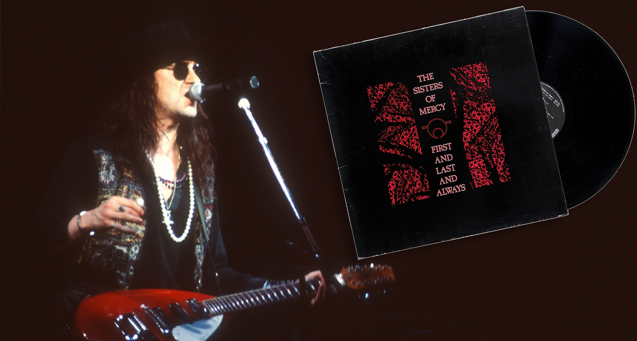 Wayne Hussey wears dark sunglasses and plays his tear-drop Vox 12-string live with the Mission in 1990.