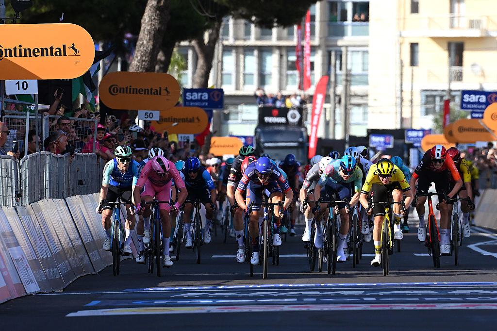 LECCE ITALY MAY 13 LR Sam Bennett of Ireland and Team Decathlon AG2R La Mondiale Mads Pedersen of Denmark and Team Lidl Trek Pink Leader Jersey stage winner Casper Van Uden of Netherlands and Team Picnic PostNL Max Kanter of Germany and Team XDS Astana and Olav Kooij of Netherlands and Team Visma Lease a Bike sprint at finish line during the 108th Giro dItalia 2025 Stage 4 a 189km stage from Alberobello Pietramadre to Lecce UCIWT on May 13 2025 in Lecce Italy Photo by Tim de WaeleGetty Images