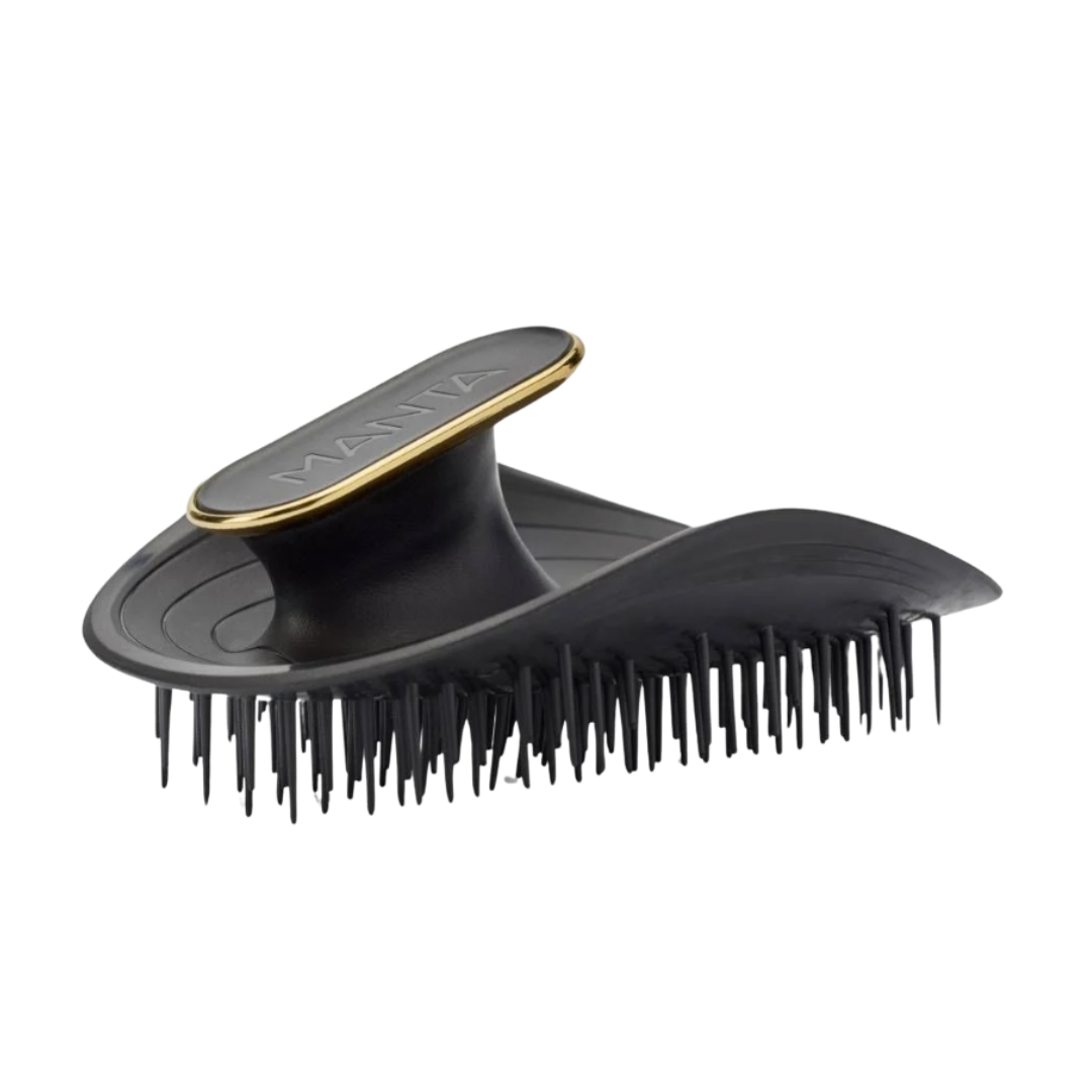 A product shot of the Manta hair brush, on a white background