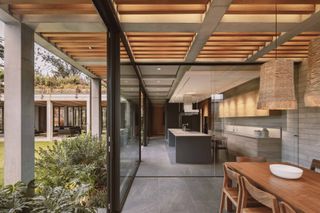 indoor and outdoor relationship at Parque Via house by SOA