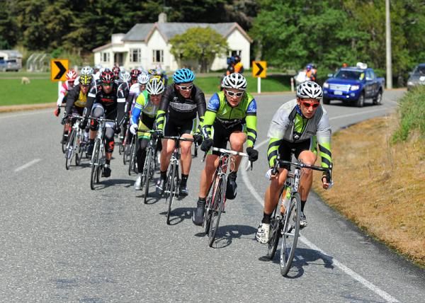 Team PowerNet ride at the front of the peloton in defence of the Yellow jersey