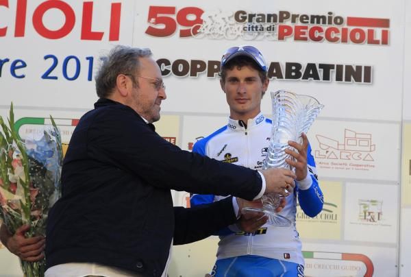 Enrico Battalgin (Colnago CSF-Inox) takes the spoils.