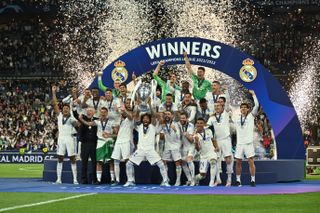 Real Madrid's players celebrate after winning the Champions League final against Liverpool in Paris in 2022.
