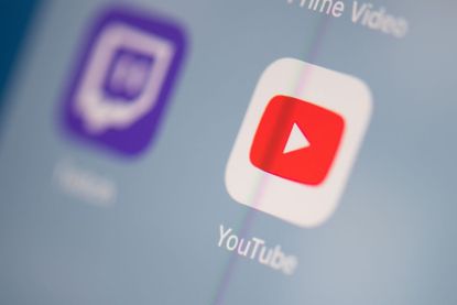 This illustration picture taken on July 24, 2019 in Paris shows the logo of the US Youtube logo application on the screen of a tablet.