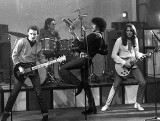 Thin Lizzy perform in Germany in 1979, Ure can be seen on the far left