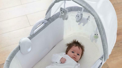 Baby laying inside Purflo PurAir Breathable Bassinet