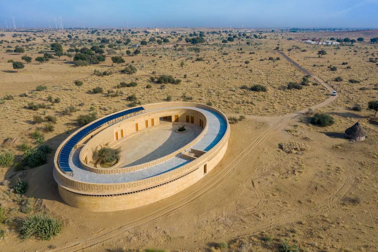 Sustainable girl&#039;s school in India is shaped like an oval from above