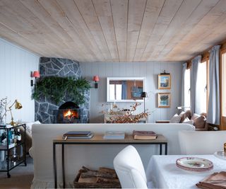 cabin style living room in Swiss chalet by Sims Hilditch