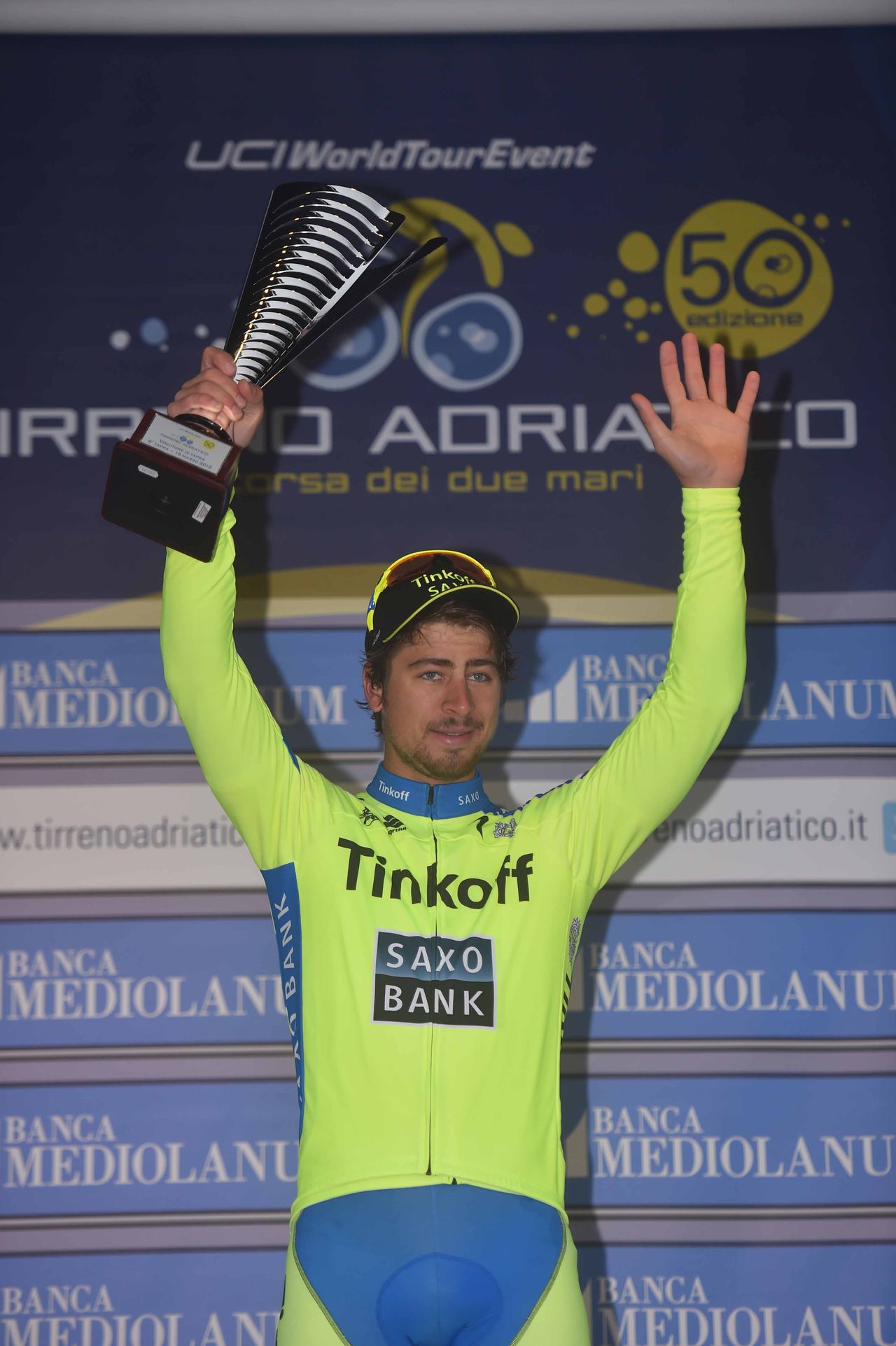 Peter Sagan waves from the podium