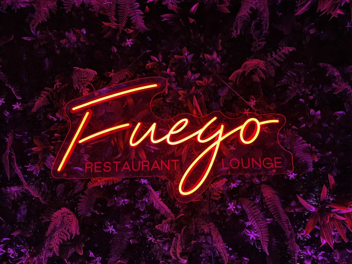 A dimly lit neon sign