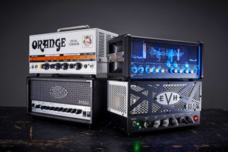 Orange Dual Terror, Hughes & Kettner TubeMeister Deluxe 20, EVH 5150III LBXII and Peavey 6505 MH stacked on top of each other.