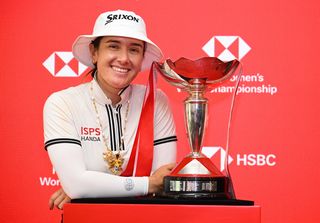 Hannah Green with the HSBC Women's World Championship trophy in 2024