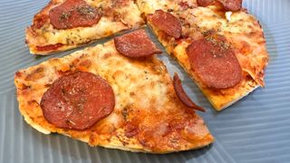 air fryer pizza on a plate