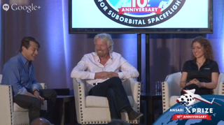 Sir Richard Branson (center) speaks with Anousheh Ansari (right) and Peter Diamandis on Oct. 4, 2014, the 10th anniversary of the Ansari X Prize.