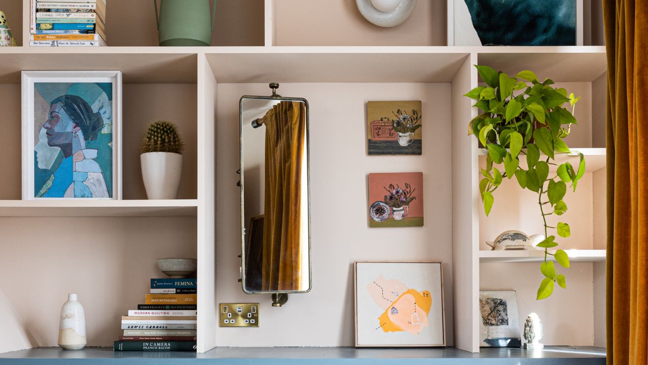 Blue fluted dresser drawers with decorative shelving