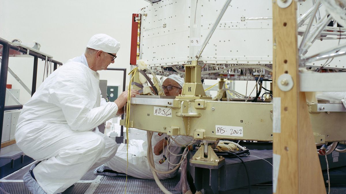 Engineers working on the Voyager spacecraft.